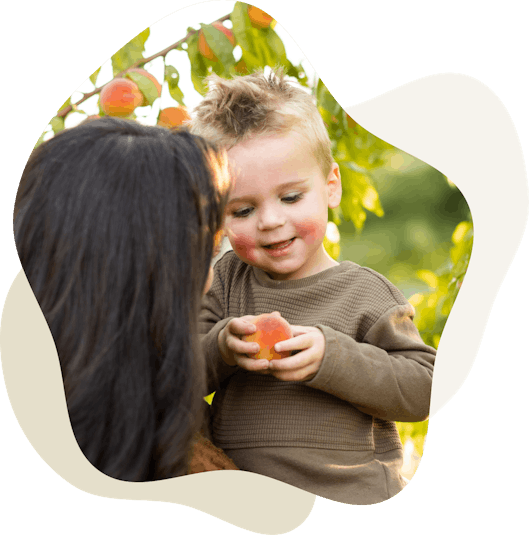 Child holding fruit