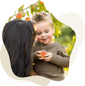 Child holding fruit